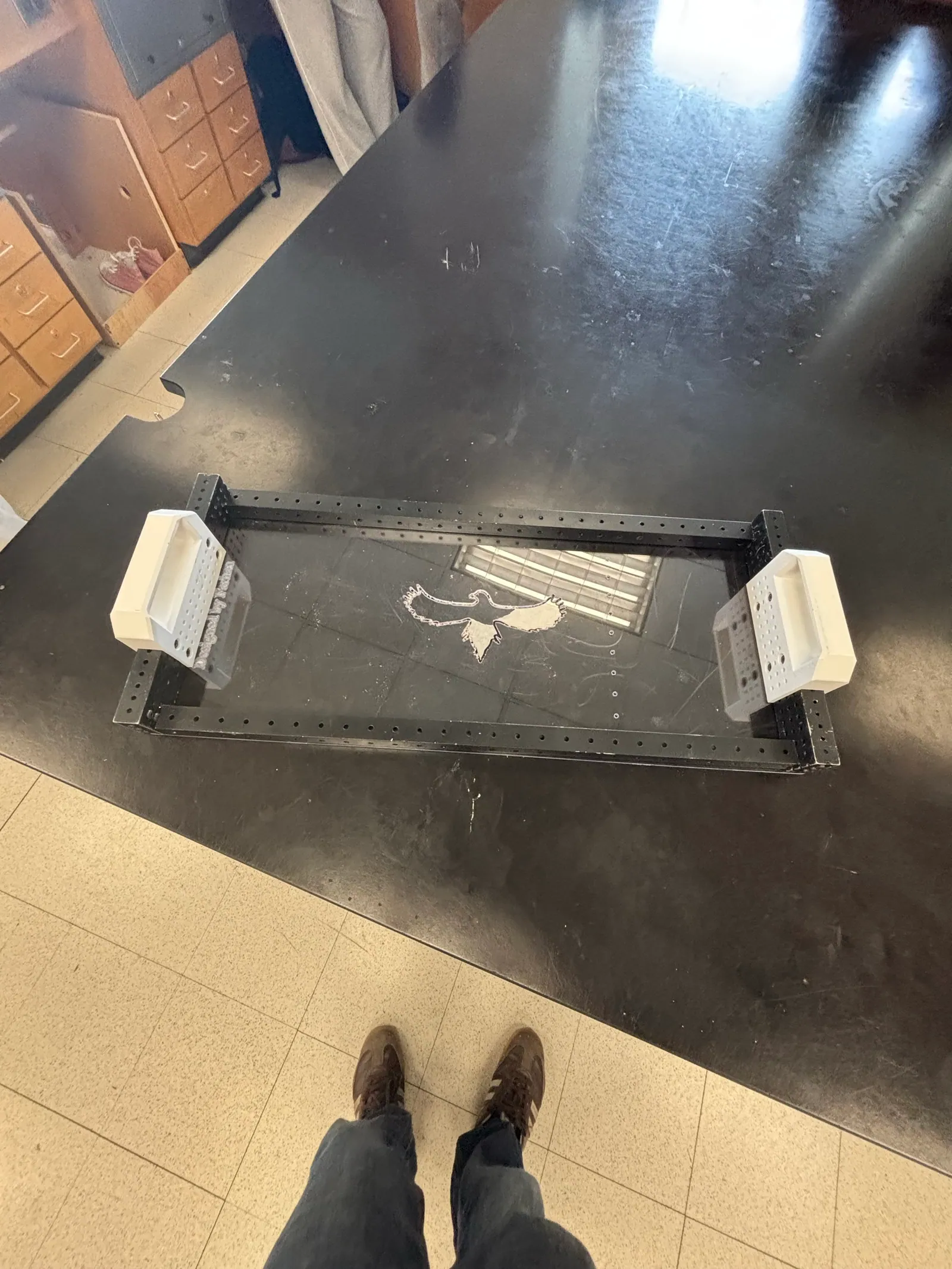The frame and handles sitting on the Lexan plate, no fasteners yet