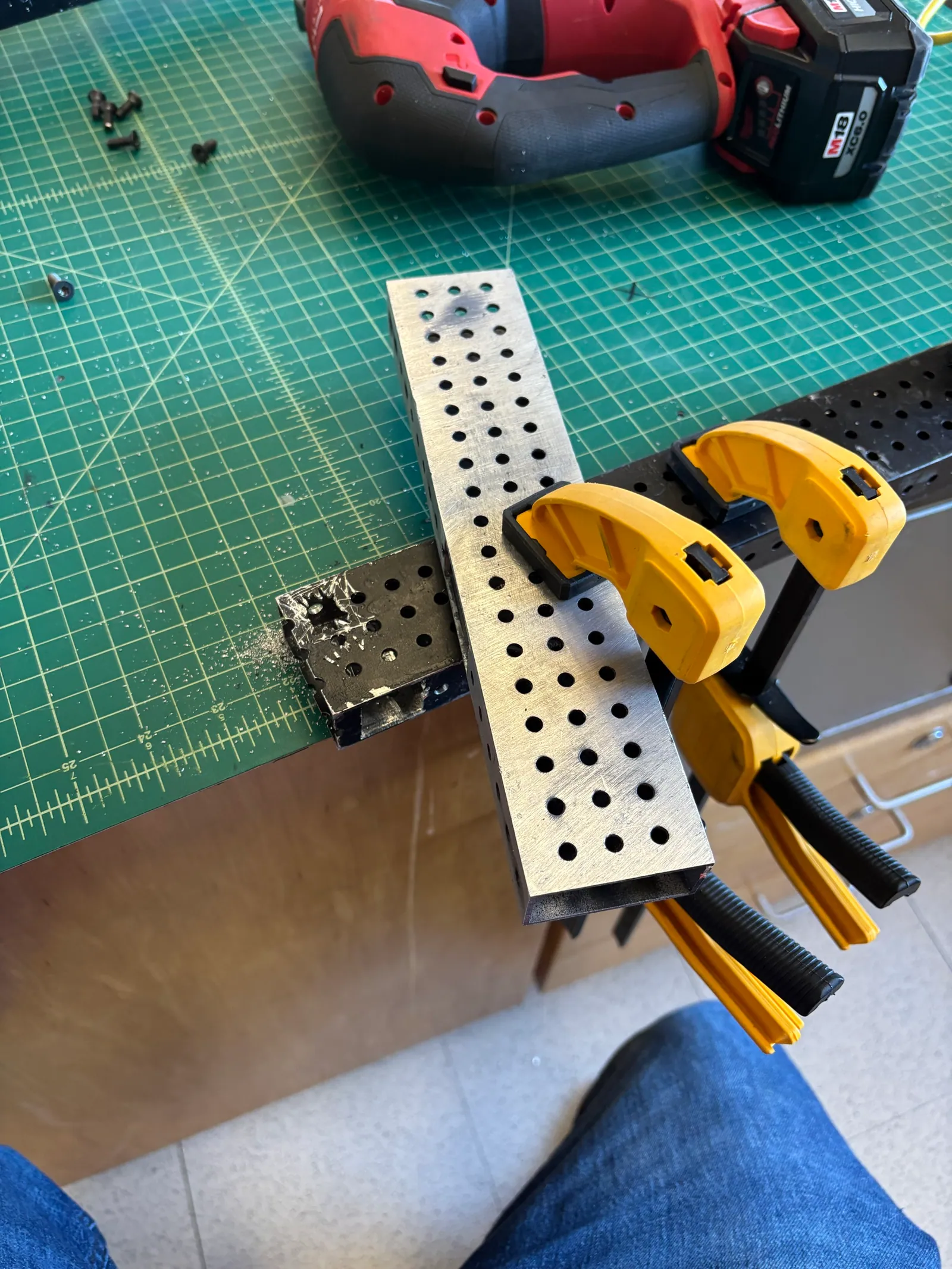 Jigsawing a wire pass-through into a clamped tube